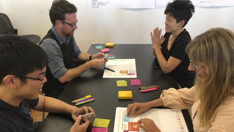 ThinkPlace staff play card game Cards Against Neutrality