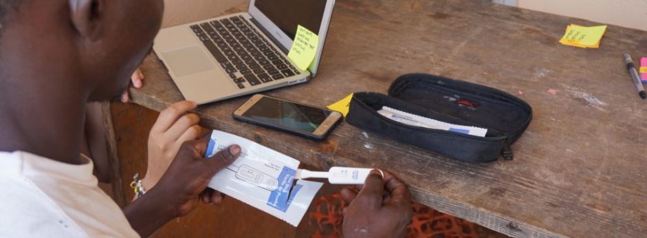 A person carries out an HIV self test